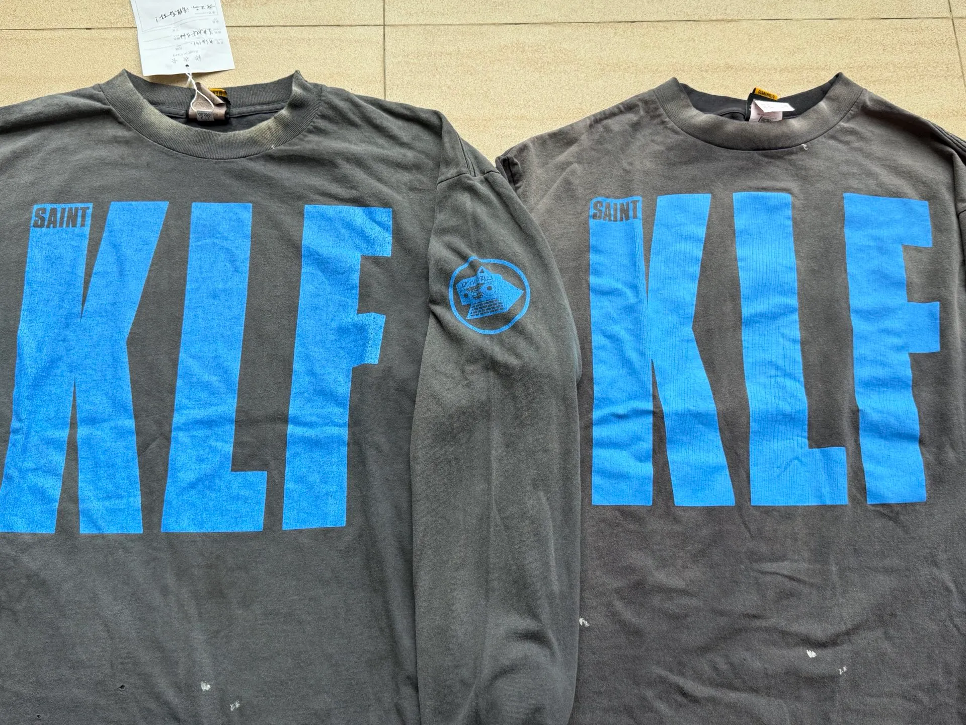 Printing board SAINT Mxxxxxx × The KLF BLUE KLF_LS TEE KLF/BLK Blue KLF tape recorder long sleeves Washed black S-XL Completely aligned Tube weaving fabric without side seams Garment dyeing Ma Liu water fading and distressing Simulated sun washing and fading treatment Natural and perfect fading Hand-made holes and fraying Ink splashing treatment Correct main mark/wash mark/little angel anti-counterfeiting mark